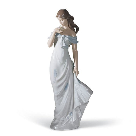 A Flower's Whisper Woman Figurine by Lladró