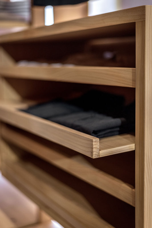 Module with pull-out trays on wooden rails (Request Info)